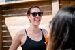 files/woman-laughing-on-patio.webp